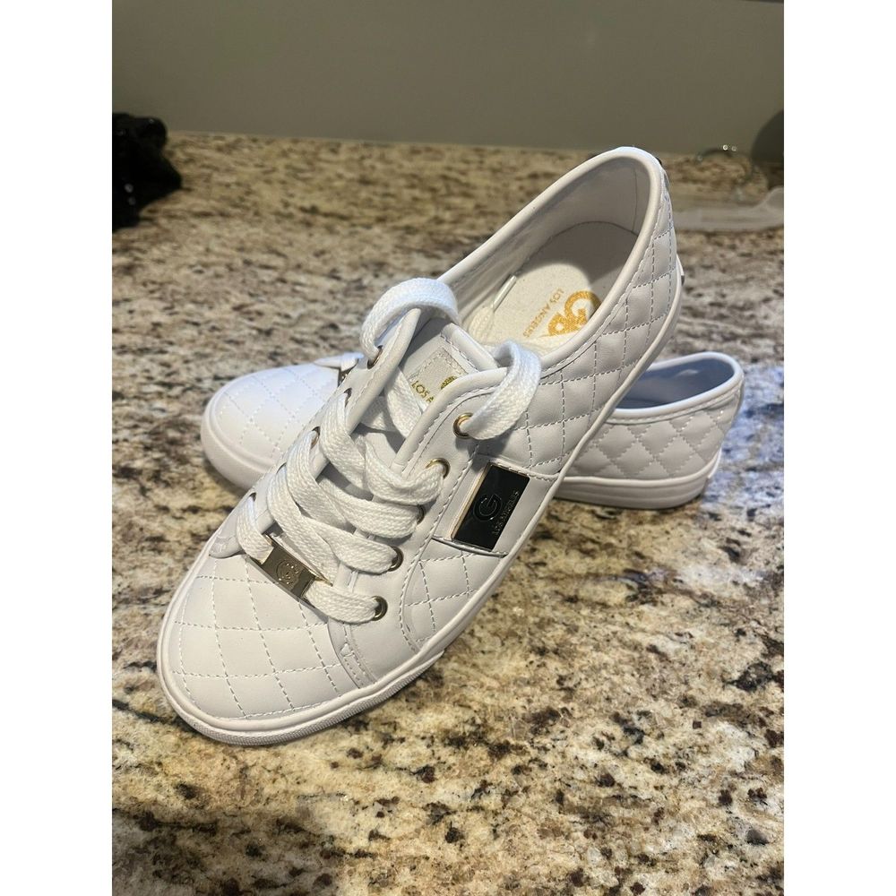 G by Guess What Sneakers with gold accents size 7